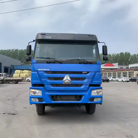 Camión volquete Sinotruck Howo de 40 metros cúbicos, 12 ruedas, camión volquete diésel de giro a la izquierda para servicio pesado en venta